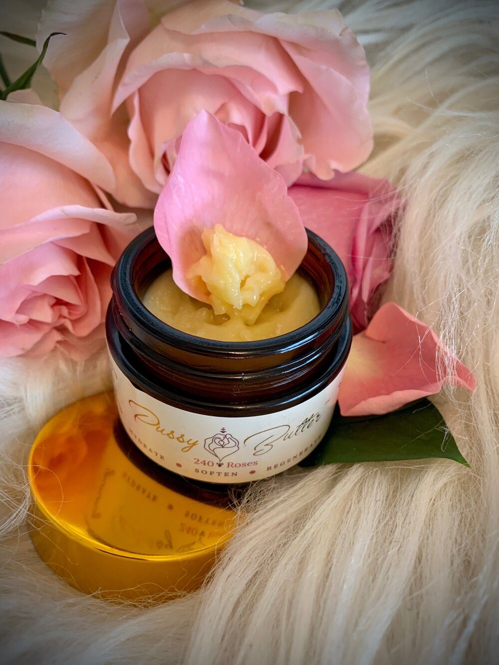 Pussy Butter™ scooped onto a rose petal