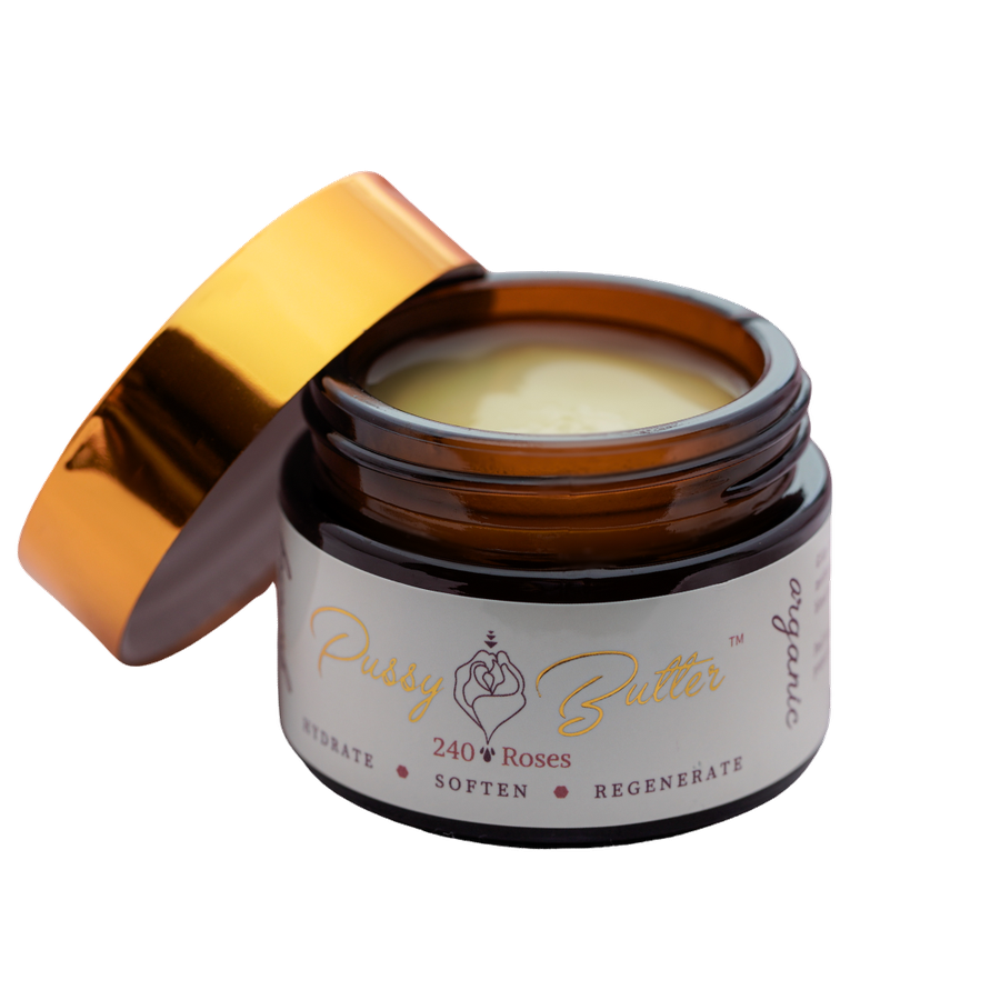 Pussy Butter™ in its signature amber glass jar with gold lid